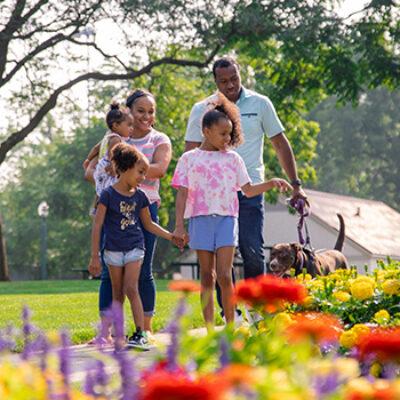 Family enjoying the beautiful blossoms in a Sioux Falls park